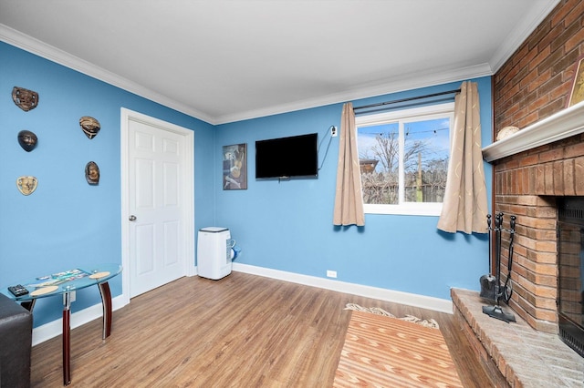 472 Lakewood Blvd, Park Forest, IL 60466 - unfurnished living room featuring baseboards, ornamental molding, a brick fireplace, and light wood-style flooring
