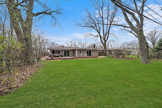 472 Lakewood Blvd, Park Forest, IL 60466 - back of house featuring a wooden deck and a yard