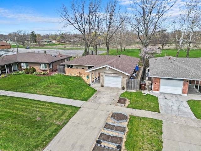 472 Lakewood Blvd, Park Forest, IL 60466 - ranch-style home with a garage, a front lawn, concrete driveway, and fence