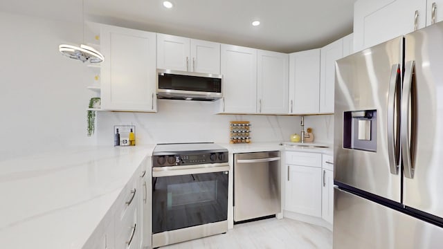 kitchen featuring recessed lighting, open shelves, white cabinets, and stainless steel appliances