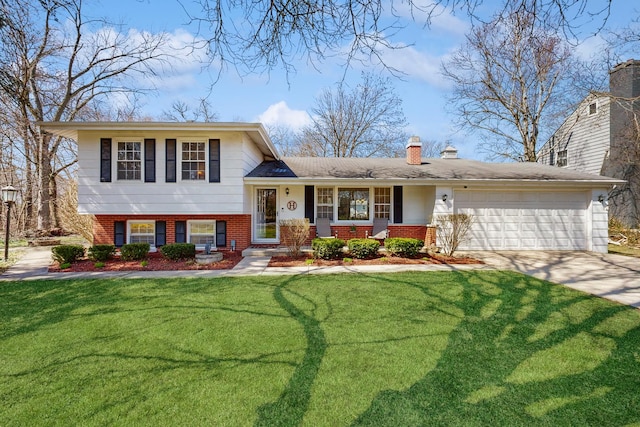 1S550 Hawthorne Ln, Wheaton, IL 60189 - split level home featuring concrete driveway, brick siding, a front yard, and a garage