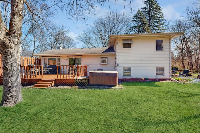 1S550 Hawthorne Ln, Wheaton, IL 60189 - back of property with a yard, a hot tub, and a deck