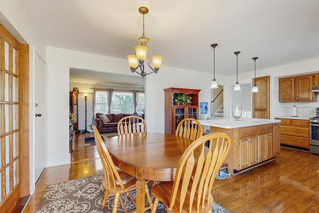 1S550 Hawthorne Ln, Wheaton, IL 60189 - dining room with an inviting chandelier, dark wood-type flooring, and stairway