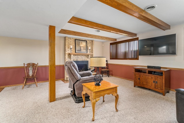 8900 W 169th Pl, Orland Hills, IL 60487 - carpeted living room featuring a fireplace, beamed ceiling, and baseboards