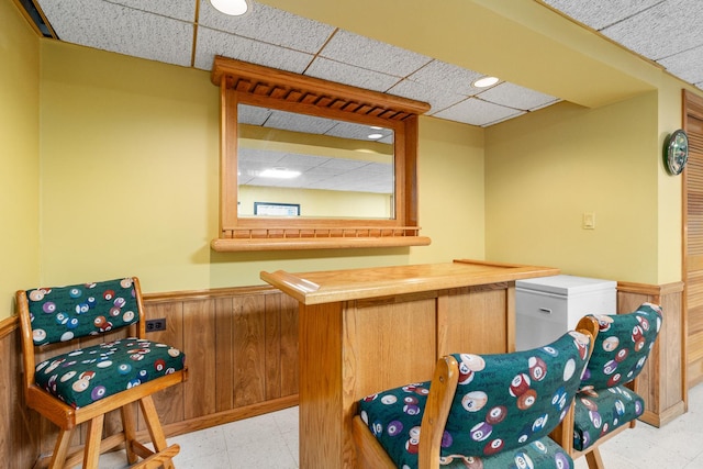8900 W 169th Pl, Orland Hills, IL 60487 - bar area with a drop ceiling, a wainscoted wall, light floors, and wood walls