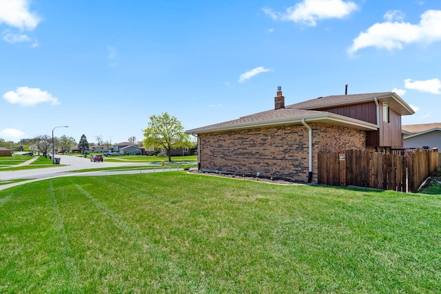 8900 W 169th Pl, Orland Hills, IL 60487 - view of side of home with a chimney and brick siding