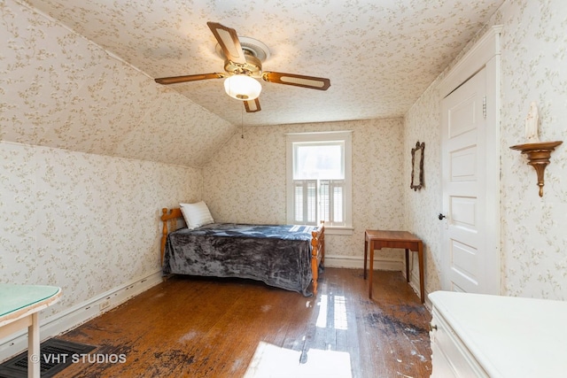 940 W Main St, Saint Charles, IL 60174 - bedroom with hardwood / wood-style flooring, vaulted ceiling, a ceiling fan, wallpapered walls, and baseboards