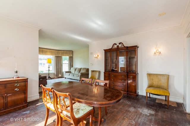 940 W Main St, Saint Charles, IL 60174 - dining space with dark wood-type flooring, ornamental molding, and baseboards
