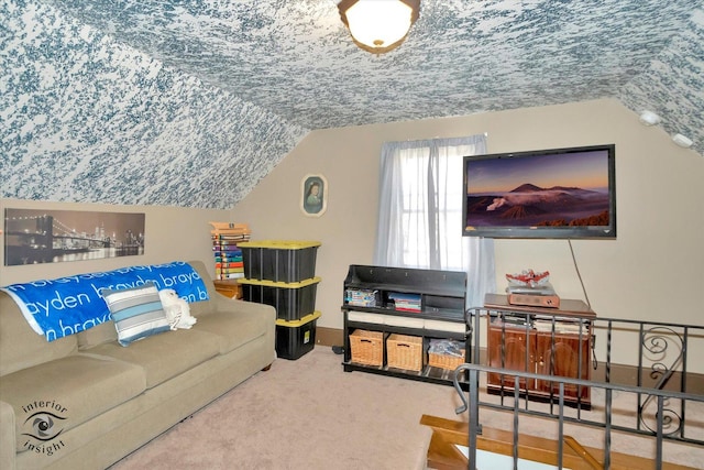 carpeted living area featuring lofted ceiling