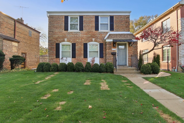 6734 N Hamlin Ave, Lincolnwood, IL 60712 - view of front of house featuring a front lawn and brick siding