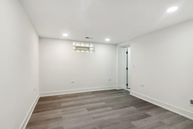 6734 N Hamlin Ave, Lincolnwood, IL 60712 - below grade area with recessed lighting, wood finished floors, and baseboards