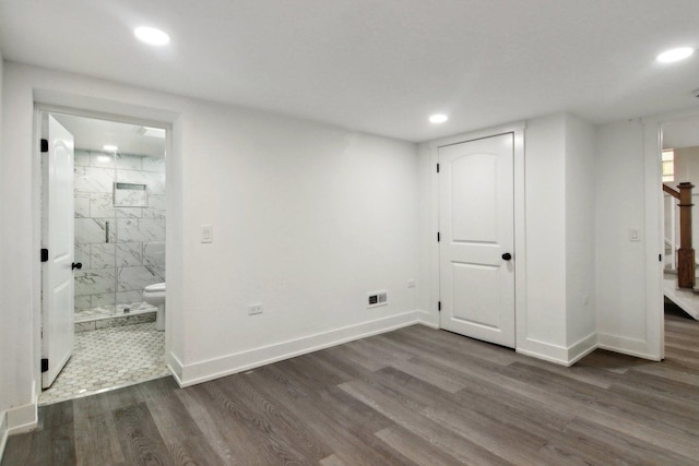 6734 N Hamlin Ave, Lincolnwood, IL 60712 - basement featuring dark wood finished floors, recessed lighting, and baseboards