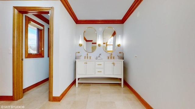 full bath with ornamental molding, double vanity, and plenty of natural light
