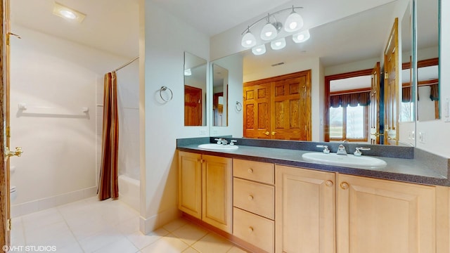 full bathroom featuring tile patterned flooring, shower / bath combination with curtain, a sink, and double vanity