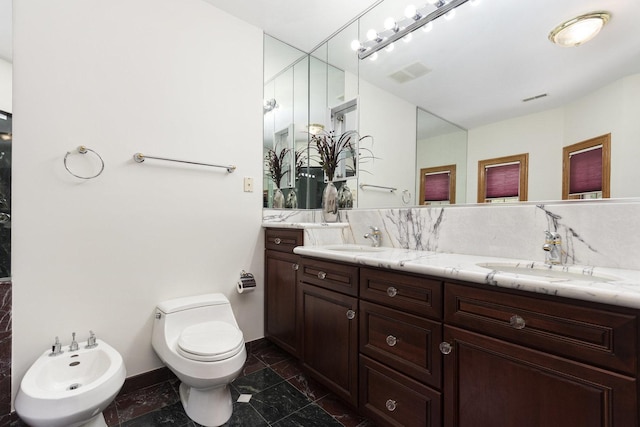 1020 Evergreen Dr, Lake Forest, IL 60045 - full bathroom featuring a bidet, double vanity, baseboards, and toilet