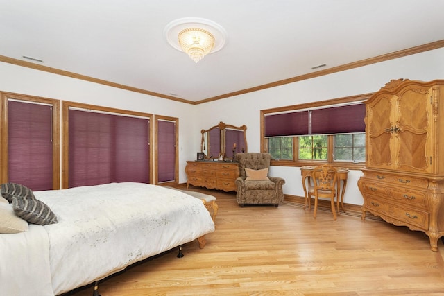 1020 Evergreen Dr, Lake Forest, IL 60045 - bedroom with light wood finished floors and ornamental molding