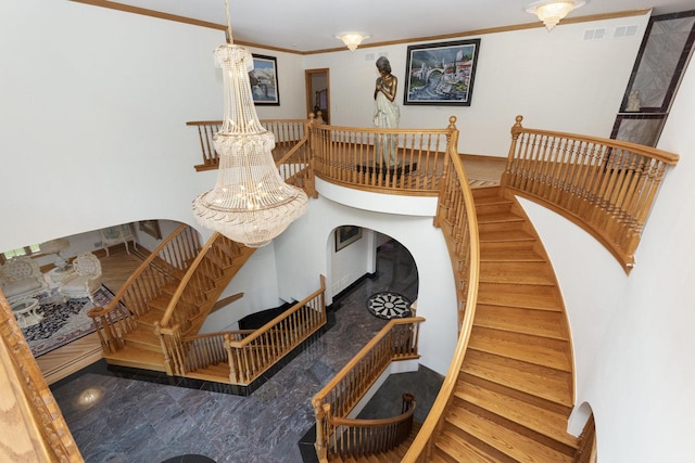 1020 Evergreen Dr, Lake Forest, IL 60045 - stairway with crown molding and a chandelier