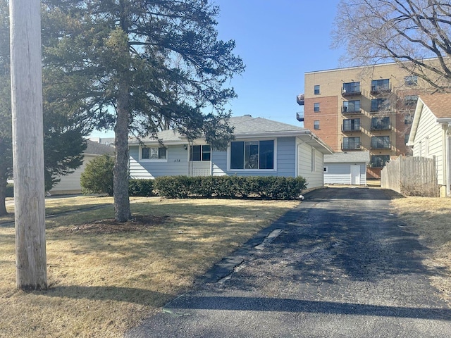 278 Rouse Ave, Mundelein, IL 60060 - view of front of property featuring aphalt driveway, fence, and a front yard
