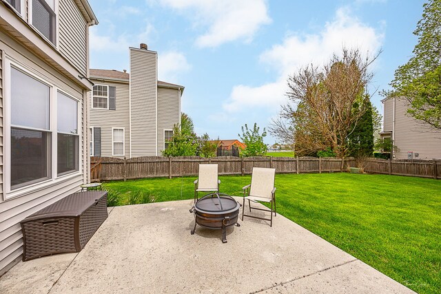 2031 Crosswind Dr, Plainfield, IL 60586 - view of patio / terrace featuring a fenced backyard and an outdoor fire pit