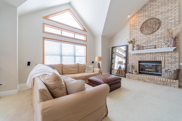 living area featuring baseboards, carpet floors, a brick fireplace, and high vaulted ceiling