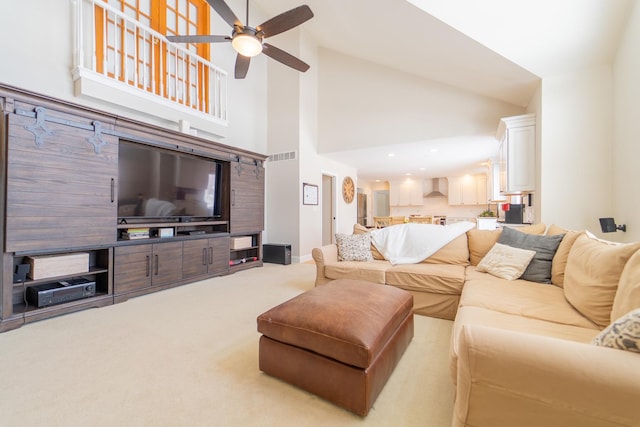 living area with high vaulted ceiling, a ceiling fan, carpet flooring, visible vents, and recessed lighting