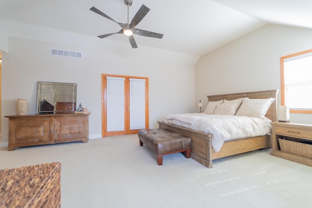 bedroom featuring carpet, vaulted ceiling, visible vents, access to exterior, and ceiling fan