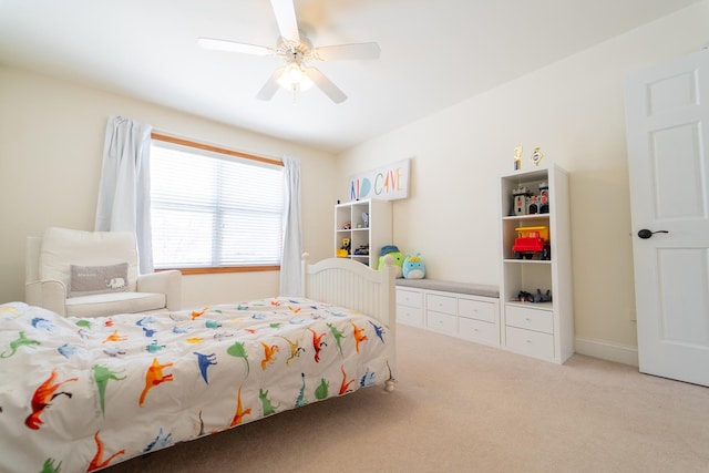 bedroom with light colored carpet and ceiling fan