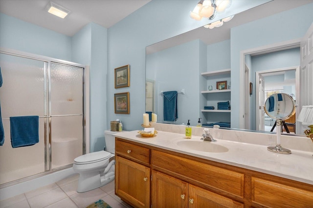 bathroom with tile patterned flooring, a stall shower, toilet, and vanity