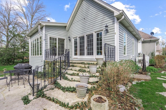 back of house featuring a patio area