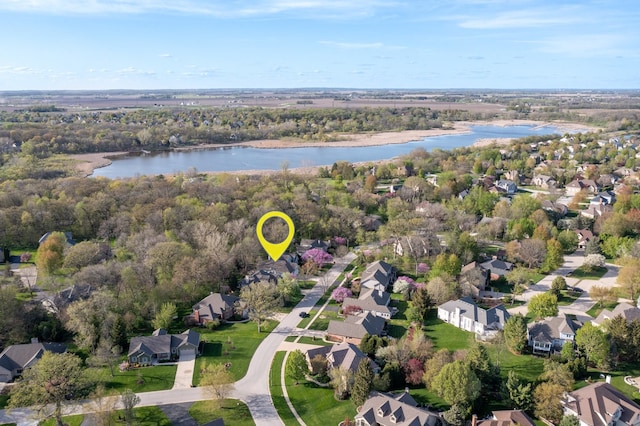 aerial view with a water view and a residential view