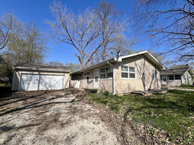 1101 N Coler Ave, Urbana, IL 61801 - view of front facade with an outdoor structure and a garage