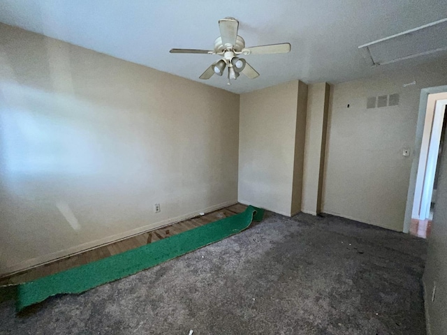 1101 N Coler Ave, Urbana, IL 61801 - empty room with a ceiling fan and carpet floors