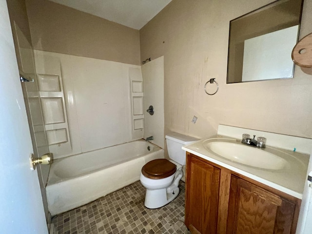 1101 N Coler Ave, Urbana, IL 61801 - bathroom featuring toilet, vanity, and shower / washtub combination