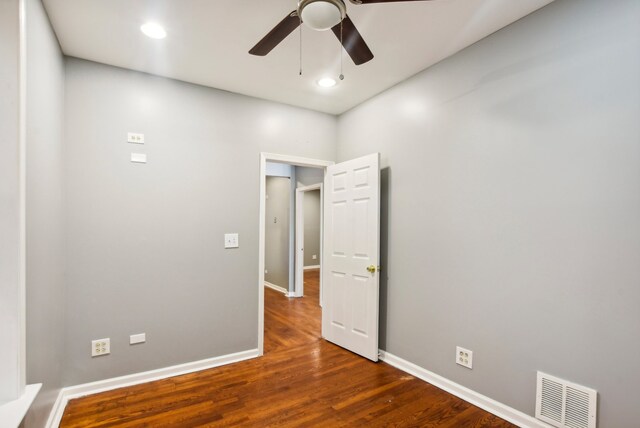 unfurnished room featuring visible vents, baseboards, ceiling fan, wood finished floors, and recessed lighting