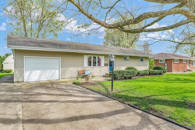 ranch-style house with a front yard, driveway, and a garage