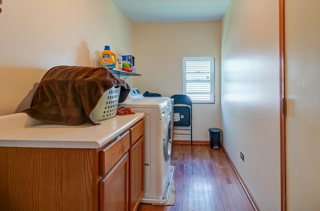 5615 Cider Grove Ct, Plainfield, IL 60586 - washroom featuring cabinet space, wood-type flooring, separate washer and dryer, and baseboards