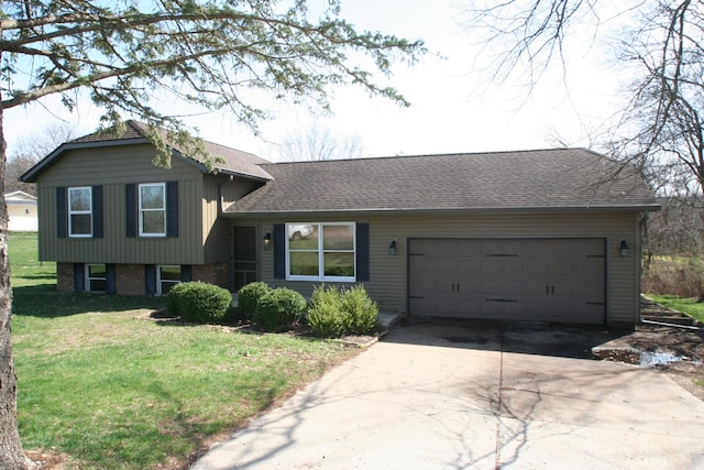 801 Heritage Dr, Mackinaw, IL 61755 - tri-level home with an attached garage, brick siding, a front lawn, roof with shingles, and driveway