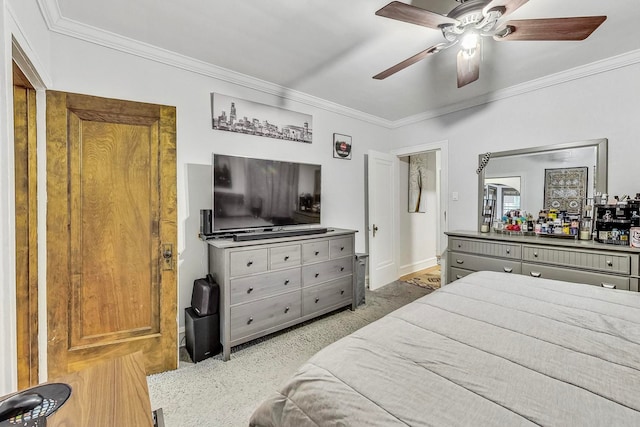 bedroom featuring ceiling fan and crown molding