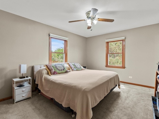 3721 Bunker Hill Dr, Algonquin, IL 60102 - carpeted bedroom featuring multiple windows, baseboards, and a ceiling fan