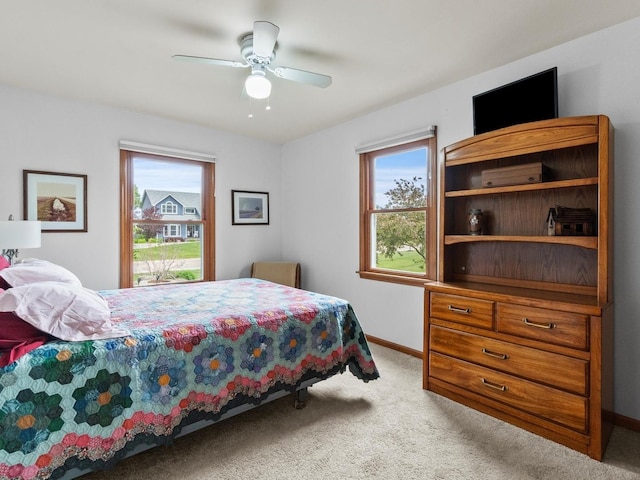 3721 Bunker Hill Dr, Algonquin, IL 60102 - bedroom with carpet flooring, multiple windows, baseboards, and a ceiling fan