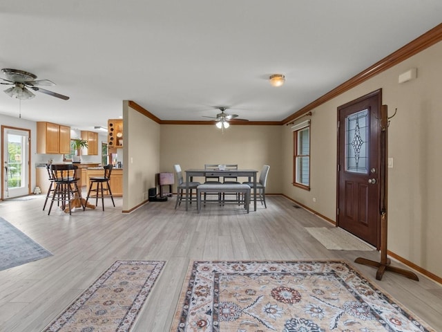 3721 Bunker Hill Dr, Algonquin, IL 60102 - entryway with ceiling fan, ornamental molding, light wood-style flooring, and baseboards