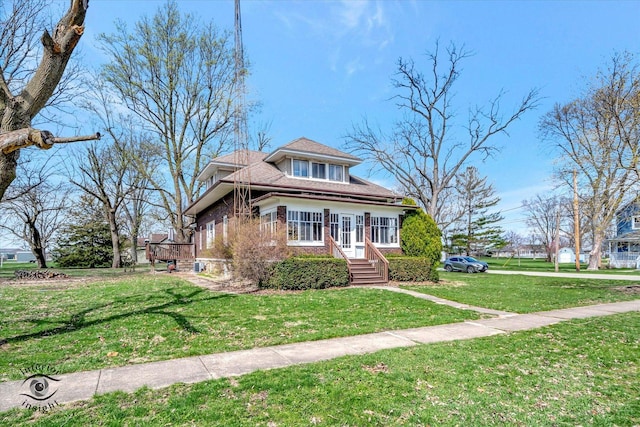 view of front of home with a front yard