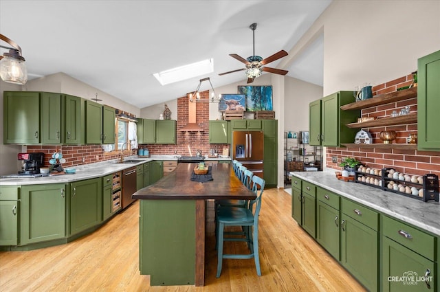 kitchen with stainless steel dishwasher, a sink, a ceiling fan, open shelves, and refrigerator with ice dispenser