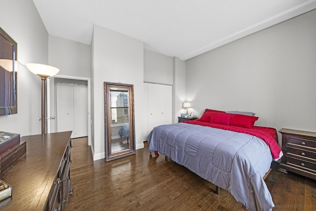 bedroom featuring wood finished floors and french doors