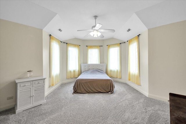 carpeted bedroom featuring vaulted ceiling, a ceiling fan, visible vents, and baseboards