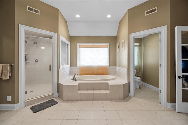 full bath featuring a bath, visible vents, toilet, and a stall shower