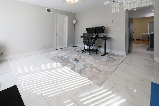 home office featuring baseboards, visible vents, and ceiling fan