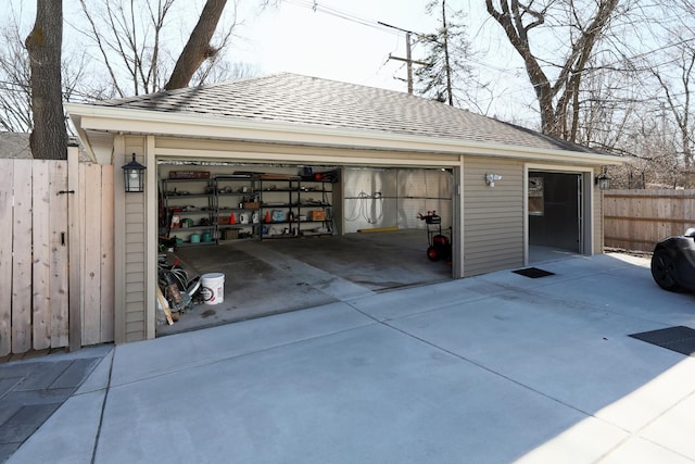 detached garage with fence