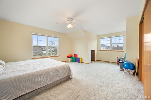 bedroom featuring baseboards, carpet flooring, and ceiling fan