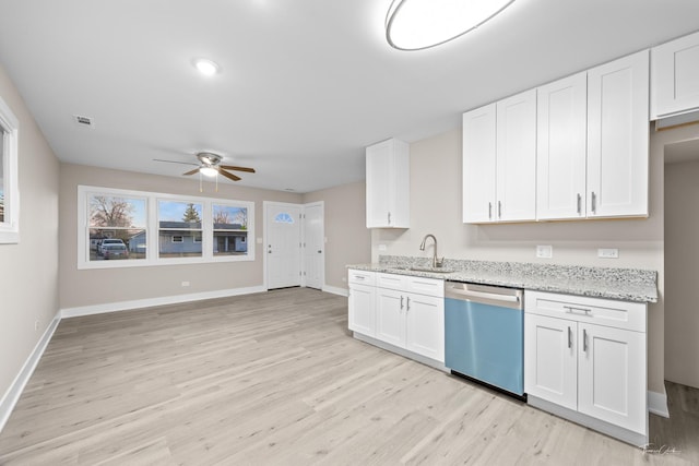 kitchen with visible vents, dishwasher, a ceiling fan, a sink, and light wood-style floors